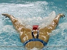 What muscle groups does swimming develop and its benefits