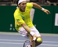 How do you execute a tennis lob?