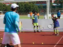 What is a good tennis drill to practice my returning of serves?