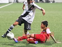 When do you use a slide tackle in football?