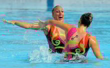 Beyond the water in Synchronised Swimming: Music, costume, make-up