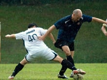 How do you tackle in football?