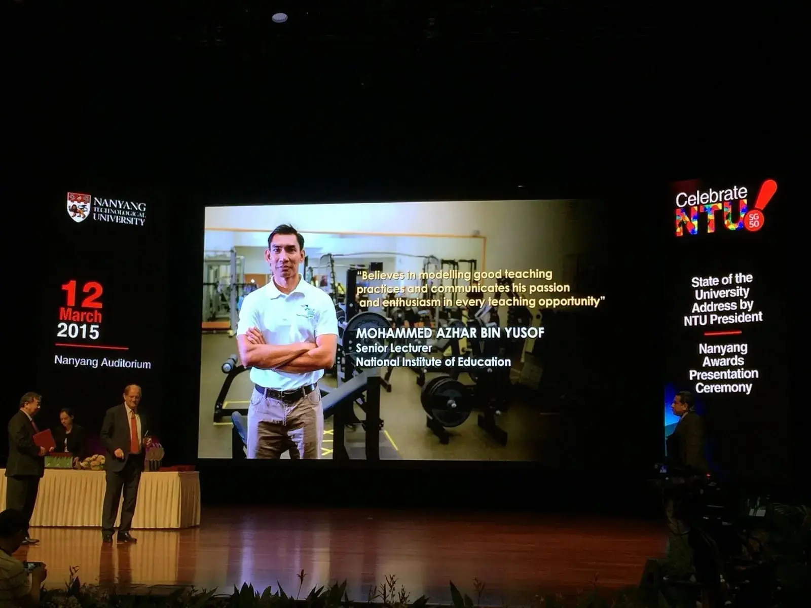 Azhar receiving an award