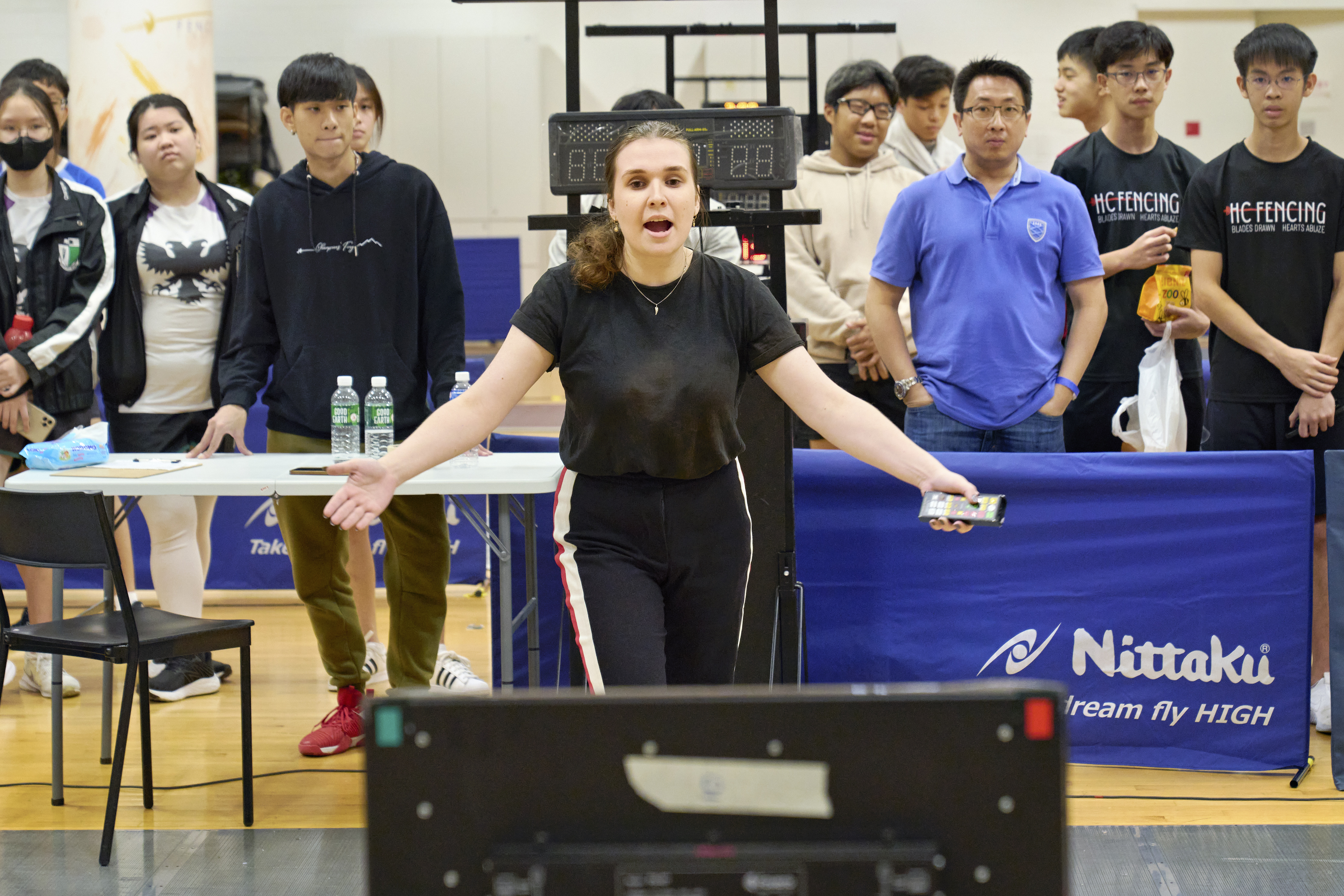 2023_04_20 Fencing Sabre A Div Boys Photo by Eric Koh, _Allez_ refree signals the start of the match DSC08524