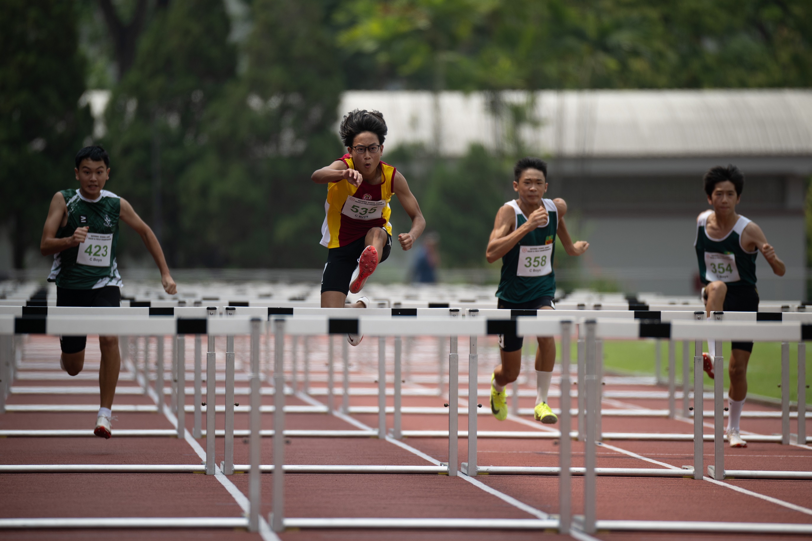 2023-04-14_National School Game T&F 2023 (PM)_Photo by Tom Ng Kok Leong_DSC_6229_C Boys 100m Hurdles Kayden Fang Rui Jun (tag 535) of VS 1st place 14.39s